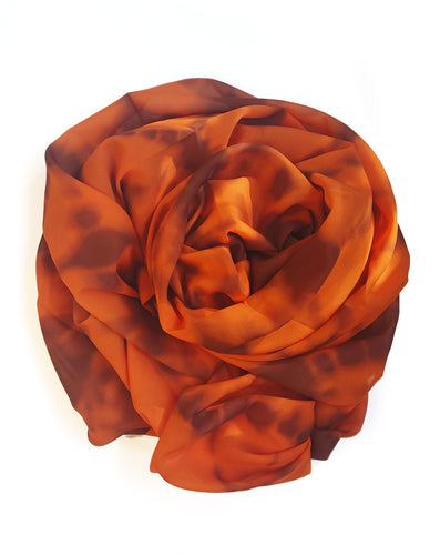 bundled orange scarf